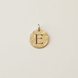 Tropic Initial Charm